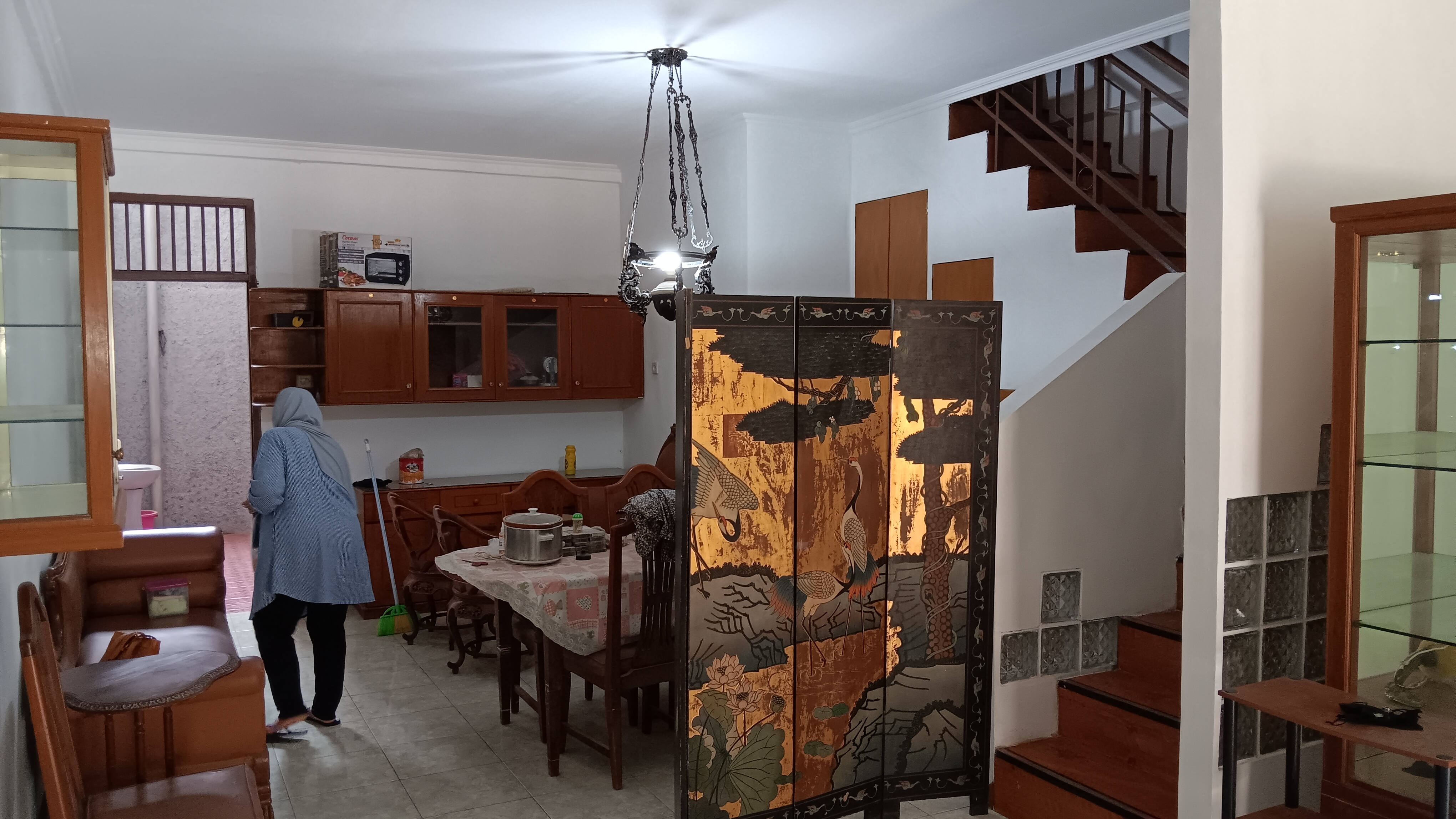 Dining area with wood table and partition